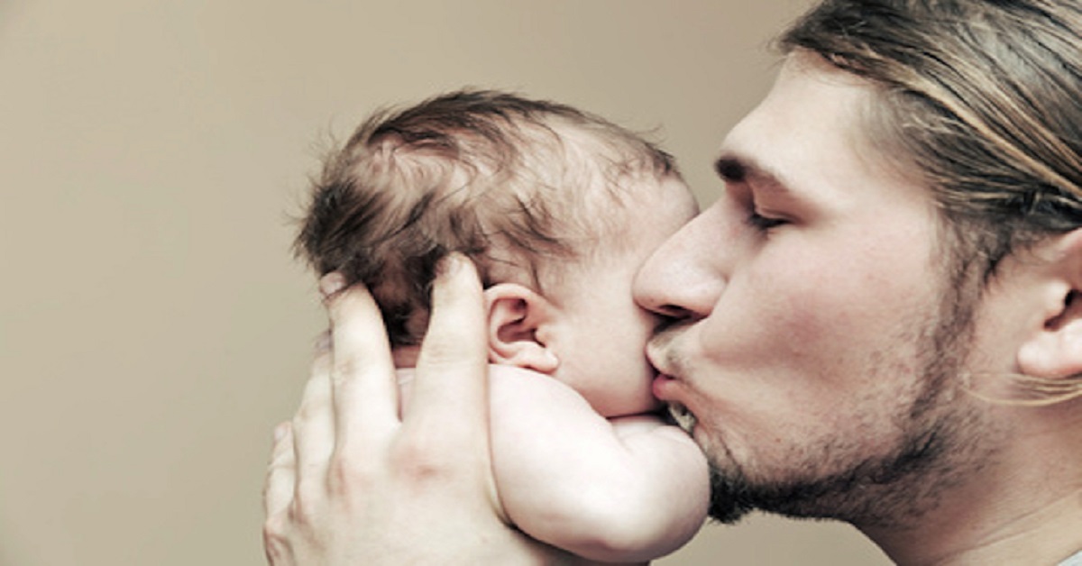kissing a baby