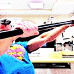 superman holding out a dowel rod