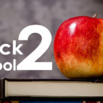 back to school with an apple and a book